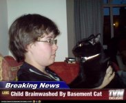 funny-pictures-cat-brainwashes-child.jpg